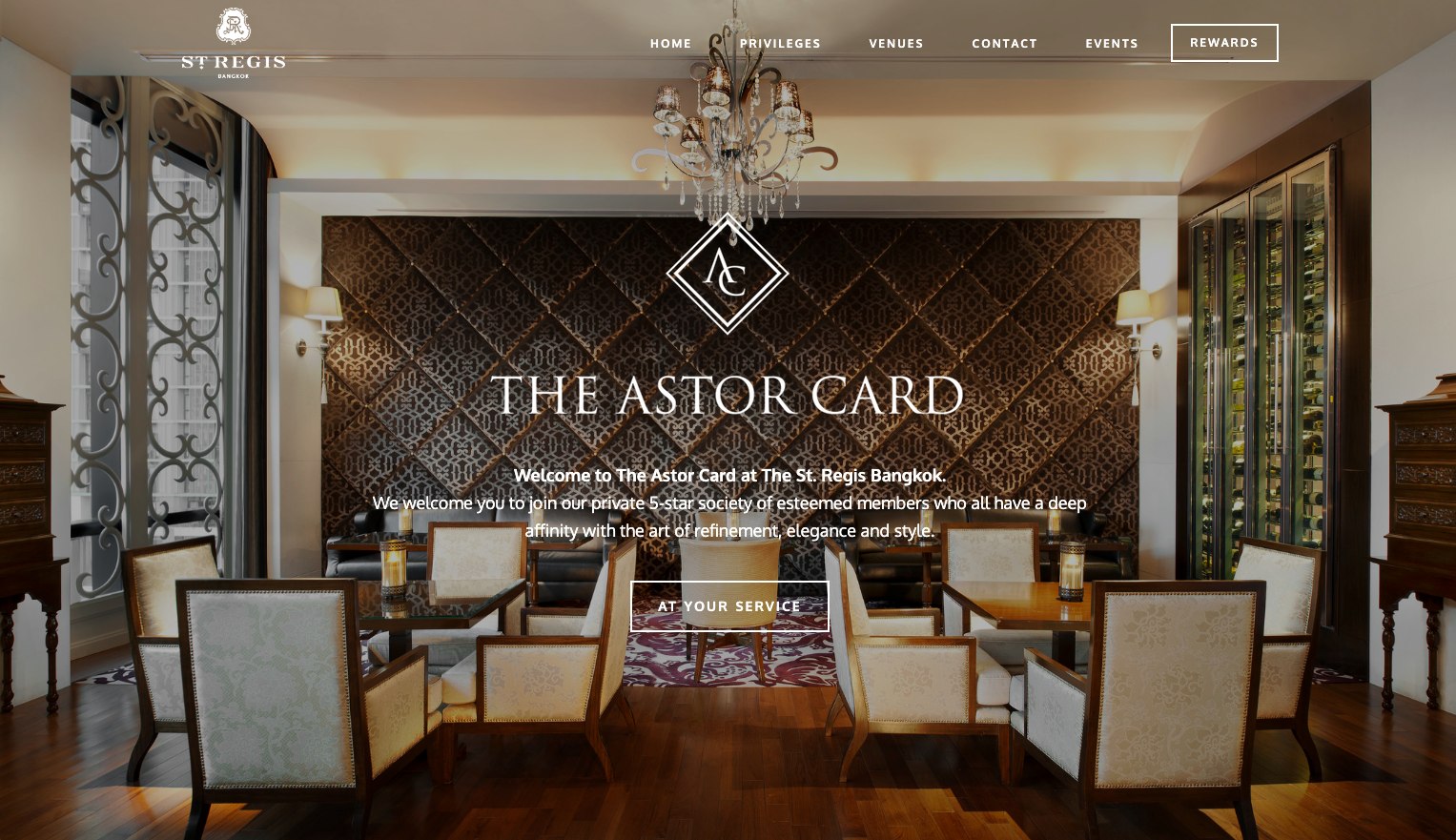 The Astor Card website home page, showing the diamond mark over a St. Regis Bangkok dining room