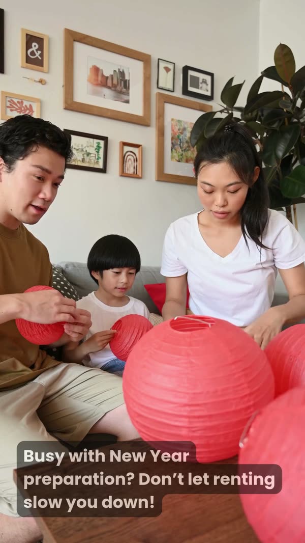 Reel of a family preparing lanterns for Lunar New Year, captioned Busy with New Year preparation?